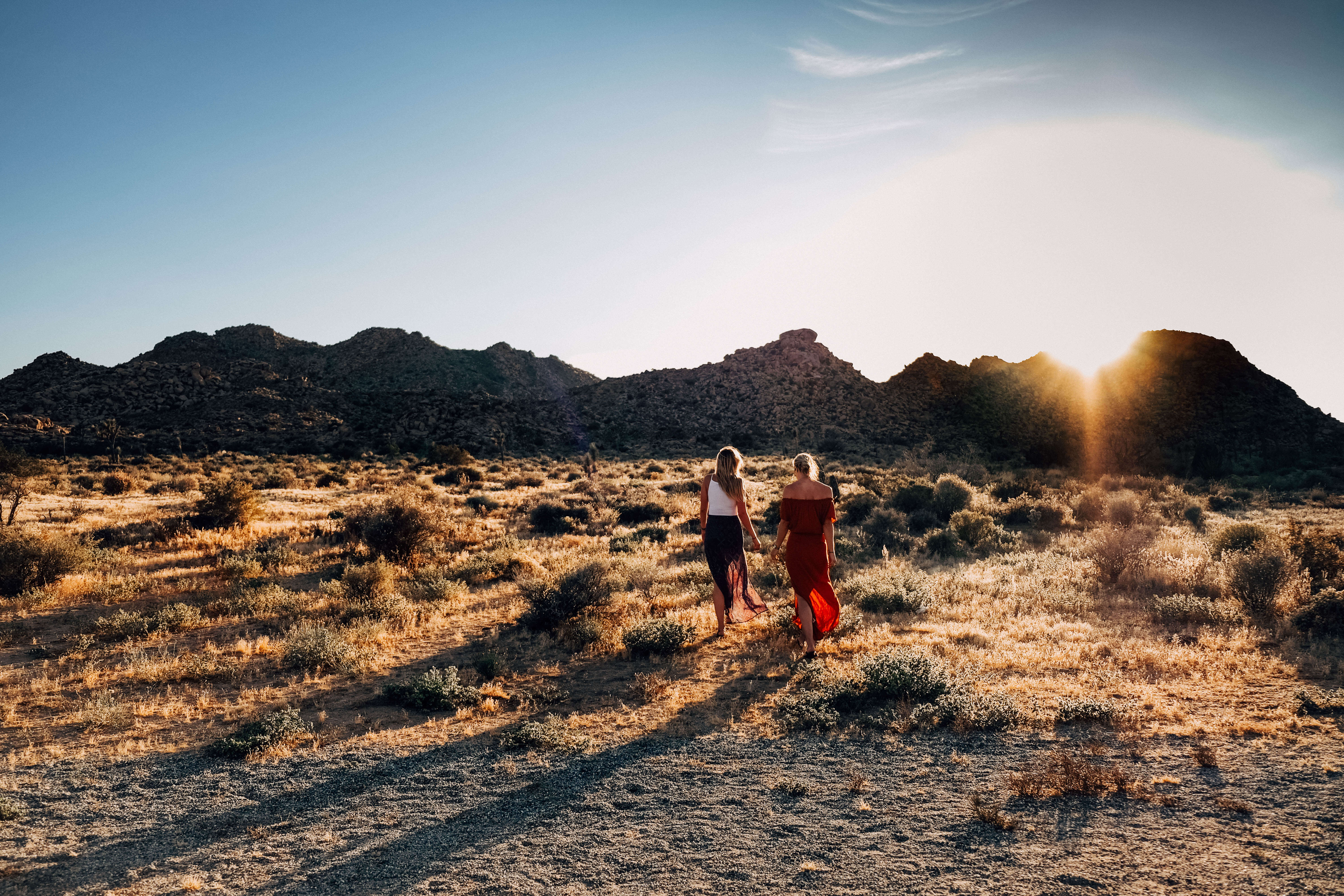 Women walking in desert