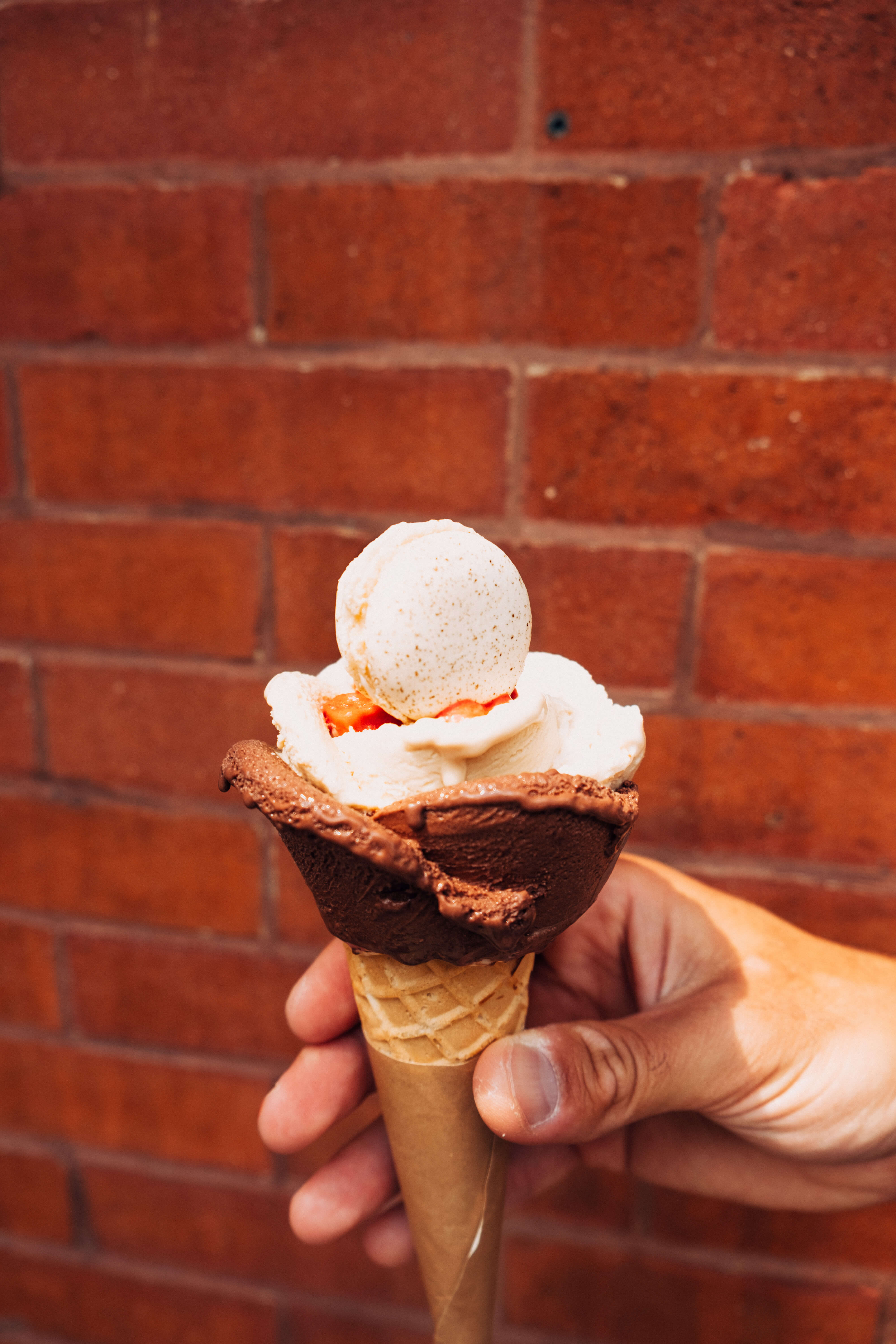 Gelato Amorino Ice cream with brick background